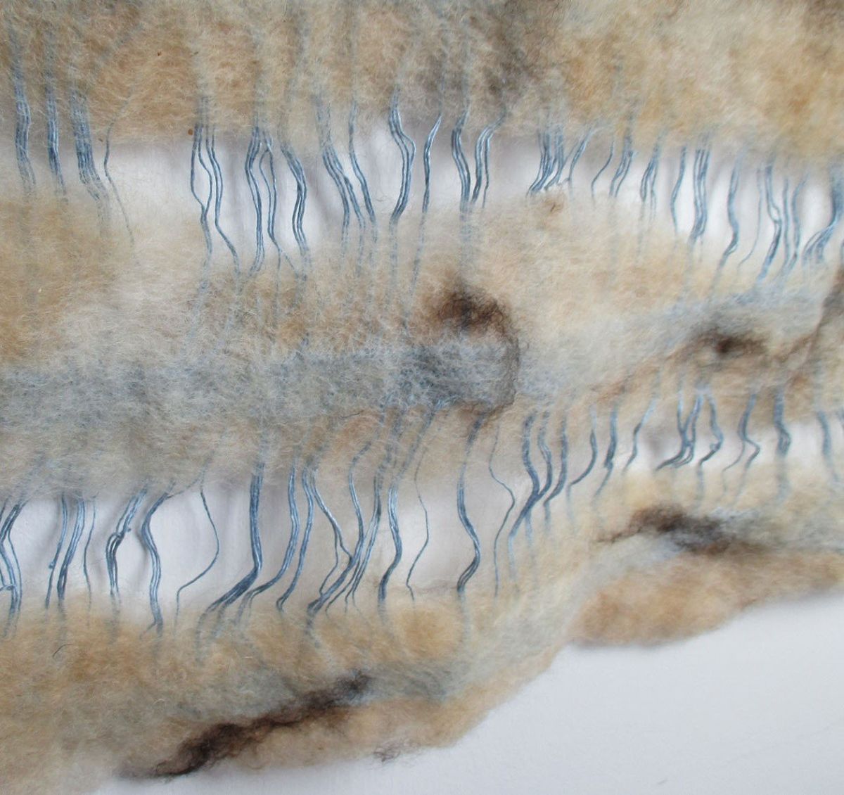 3 - Close up of the fabric qualities created with knit and felt