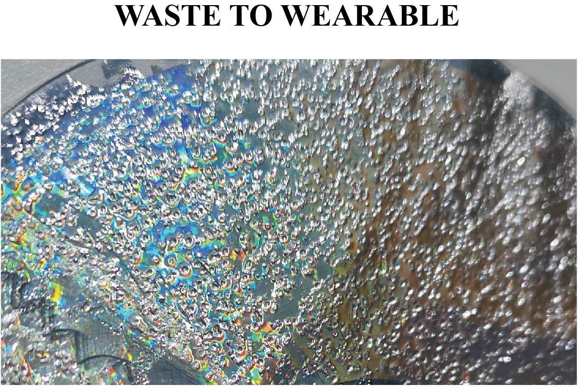 1 - Waste to Wearable. 2 - My material. 3 - My colour palette inspiration. 4 - Applying colour to CDs. 5 - Applying heat to CDs. 6 - Vibrant coloured pendants. 7 - Vibrant layer necklace. 8 - Dome earring. 9 - Hanging domes. 10 - Statement earrings.