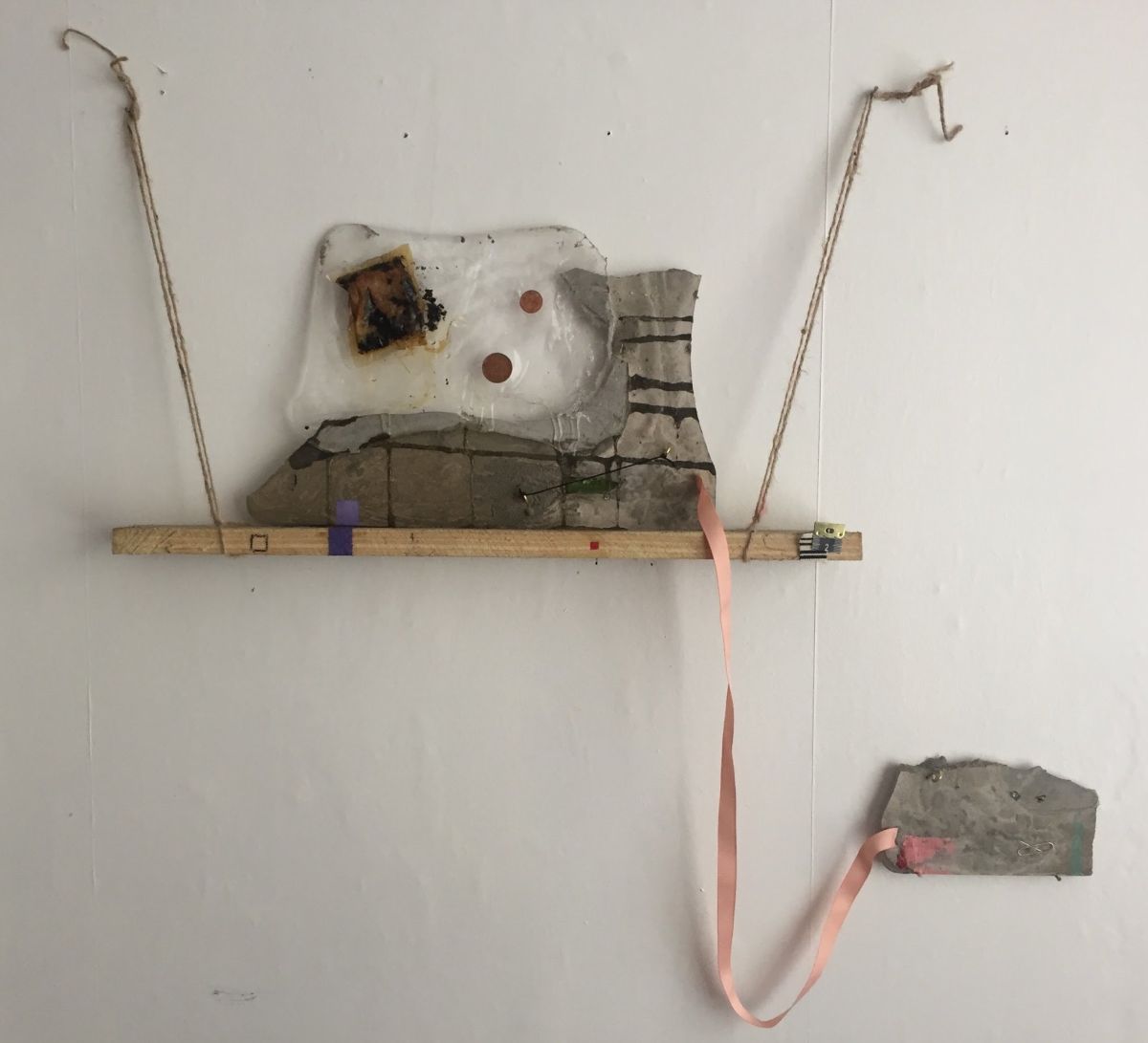 image 8- 'The Bad Batch', concrete, resin, ribbon, wood, string, coins, teabags.