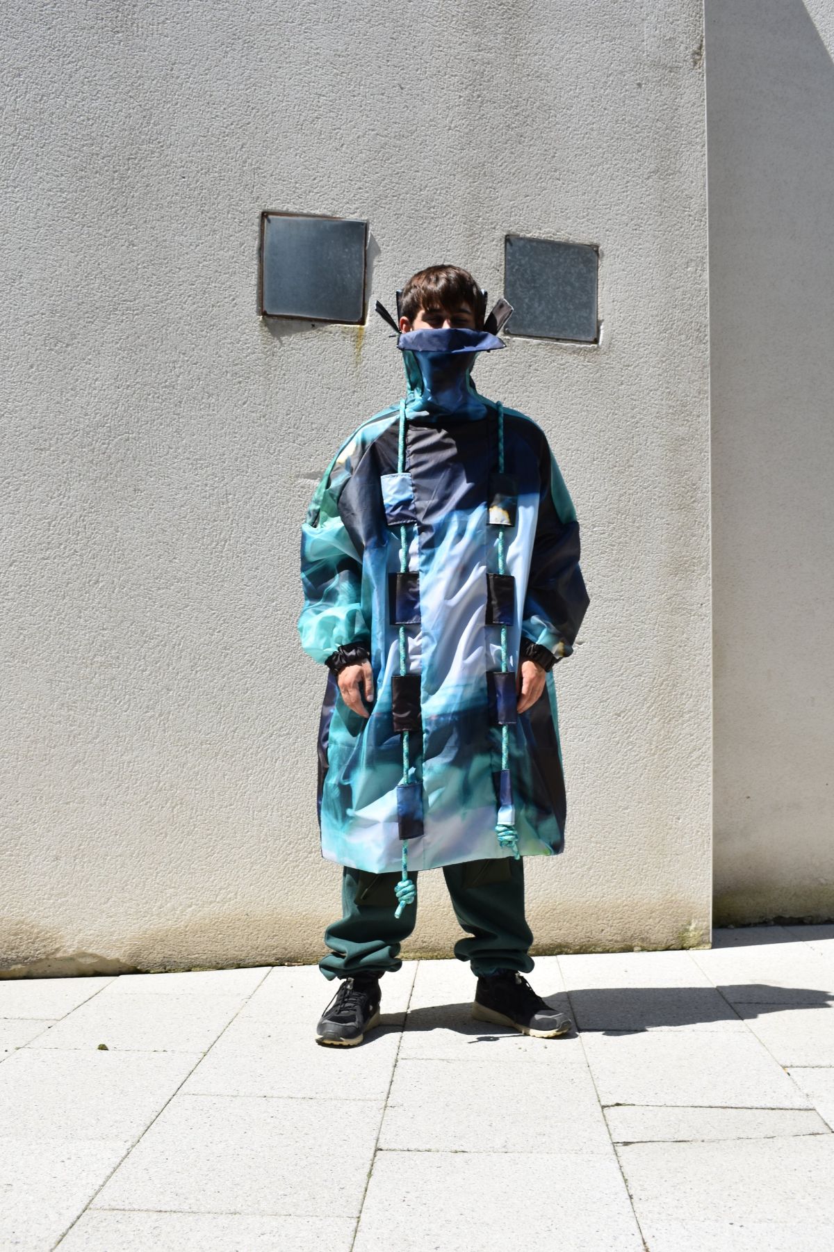 4 digitally printed ripstop coat with paracord detail.