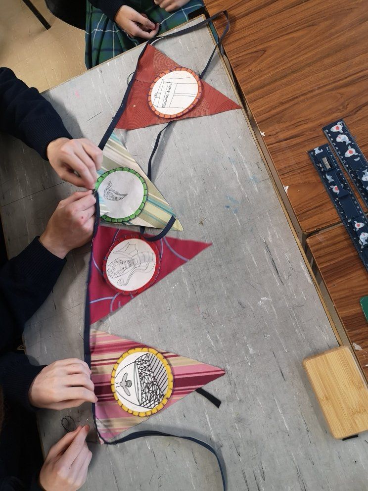 Kate Cunningham Stitching image: Students develop bunting further through experimenting with stitch techniques and fabrics.