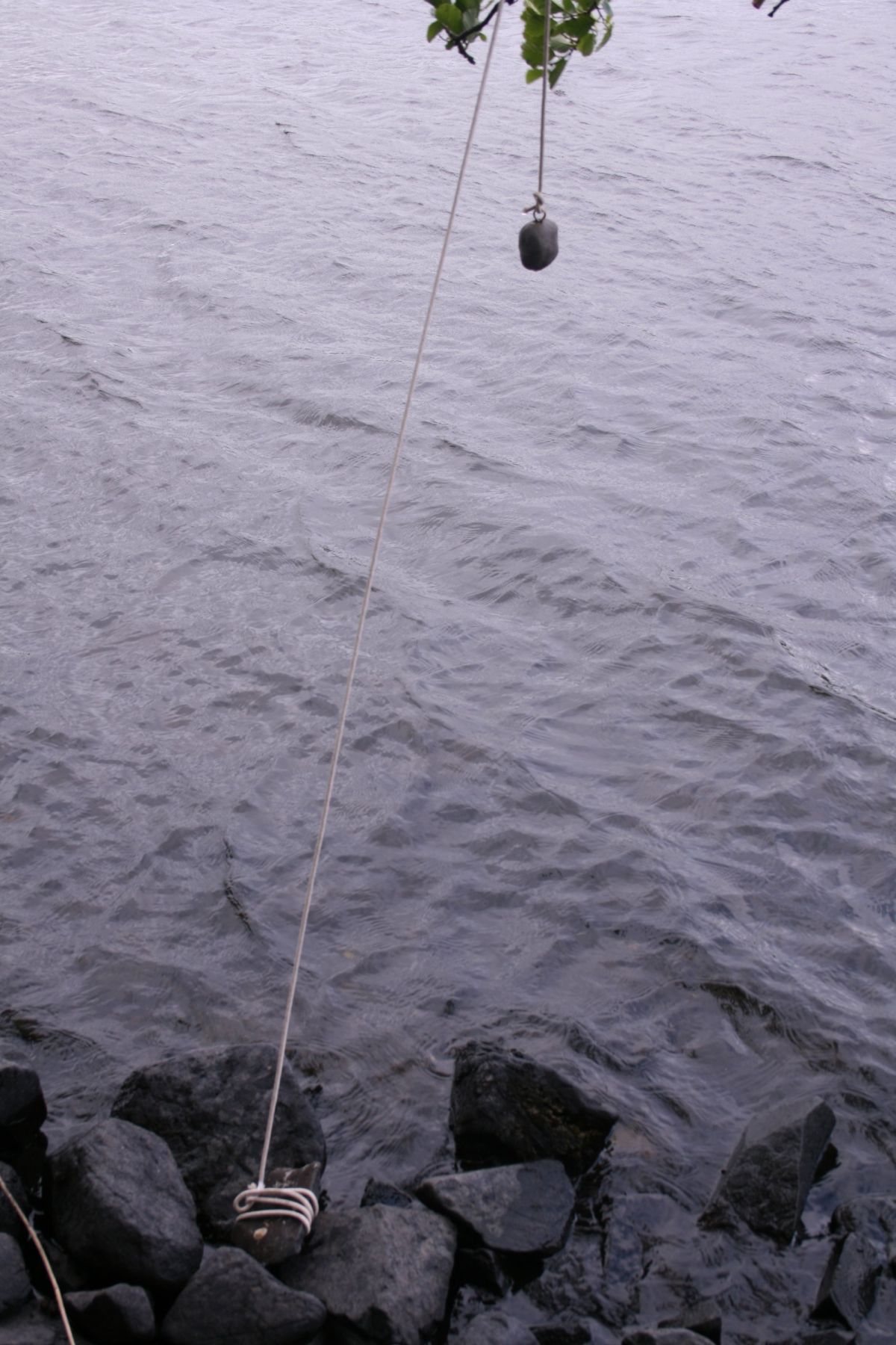 7-'Wavering', Clay pulley system and body of water.