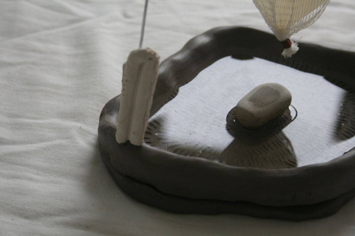 4-'Porous Potential', clay water and wire sculpture.