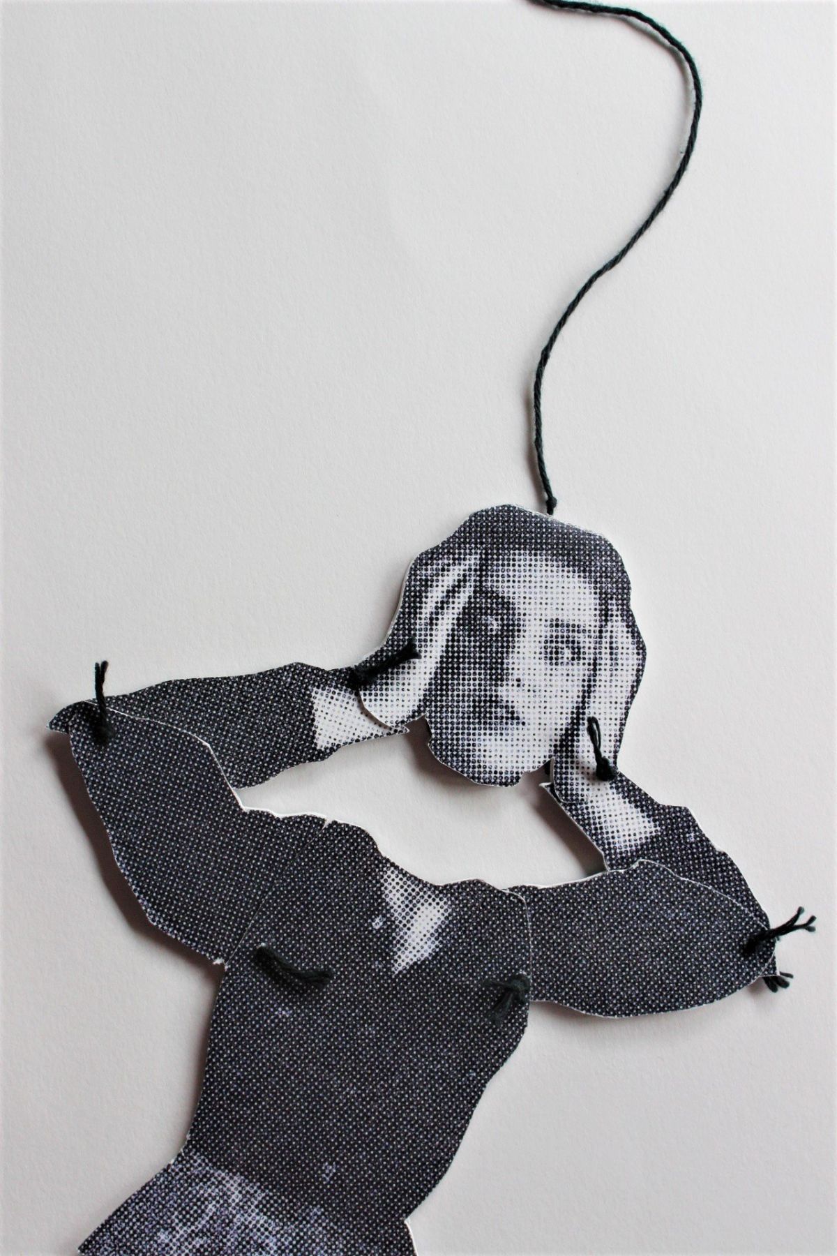 1 - Image contains a 'puppet' built from a photo manipulation used in a larger paper assembly / Niamh Hughes