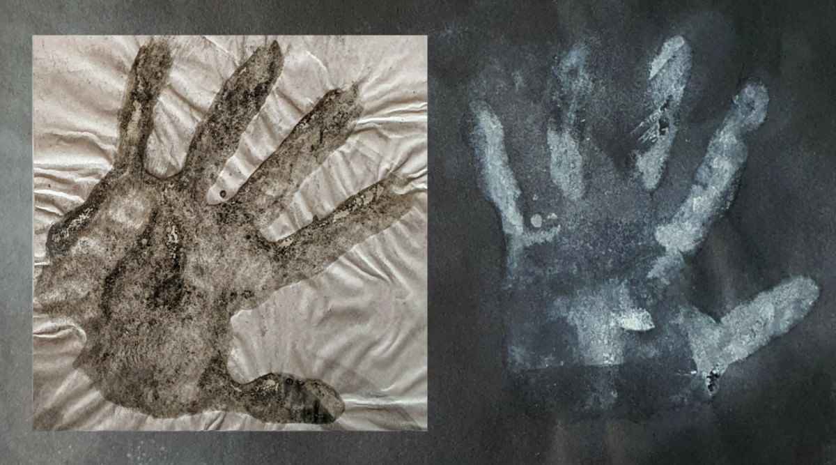 Hand prints (egg white, charcoal dust and ground conte on paper)